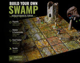 A modular magnetic terrain set for tabletop gaming featuring square tiles with a swamp theme, a ruined stone tower, bare trees, and a stone obelisk. The text reads BUILD YOUR OWN SWAMP MODULAR MAGNETIC TERRAIN and ITEMS SOLD SEPARATELY.