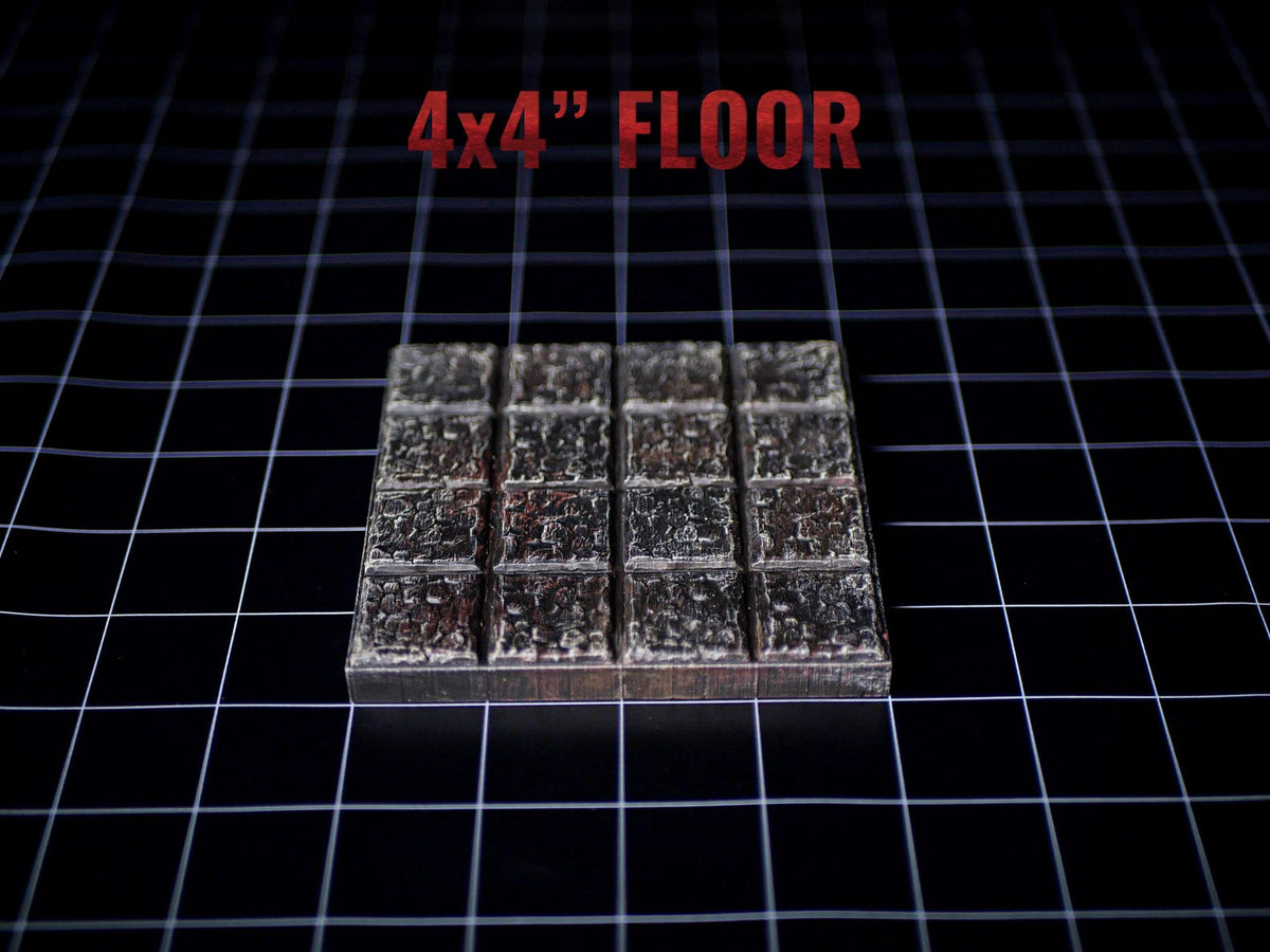A square floor tile piece featuring a 4x4 grid of textured, dark grey stone-like blocks. The text 4x4 FLOOR is printed in red above the object. The tile has a weathered, uneven surface with deep crevices between each individual square.