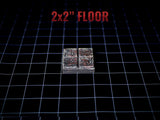 A square 2x2 inch floor tile piece with a dark, weathered stone texture featuring deep grey and reddish-brown tones. The surface is divided into four smaller square sections by a cross-shaped groove, creating a realistic stone floor appearance.